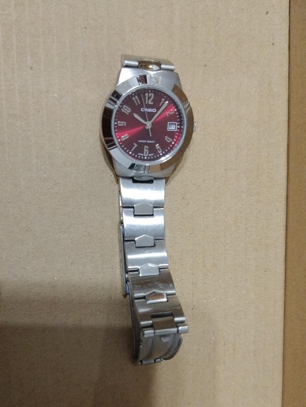 Casio Silver Watch with Red Dial
